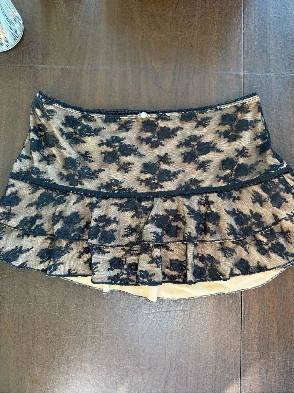 Edikted Black Lace Tiered Mini Skirt over Nude Lining